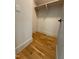 Walk-in closet with hardwood floors, ample shelving, and ready for custom organization at 324 Waldo St, Cary, NC 27511