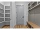 Mudroom with built-in shelving and bench, providing ample storage and seating at 324 Waldo St, Cary, NC 27511