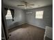 Simple bedroom with carpet and ceiling fan at 3395 Nc Hwy 210, Smithfield, NC 27577