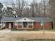 Brick ranch house with attached garage and carport at 3395 Nc Hwy 210, Smithfield, NC 27577