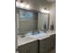 Double vanity bathroom with modern lighting at 3601 River Watch Ln, Franklinton, NC 27525