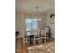Charming dining room with wood table and hardwood floors at 3601 River Watch Ln, Franklinton, NC 27525