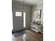 Elegant entryway with hardwood floors and art at 3601 River Watch Ln, Franklinton, NC 27525