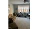 Bright game room featuring a comfortable seating area and exercise bike at 3601 River Watch Ln, Franklinton, NC 27525