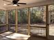 Relaxing screened porch overlooking a wooded backyard at 3601 River Watch Ln, Franklinton, NC 27525