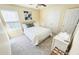 A bedroom with a bed, ceiling fan, and carpeted floors at 4809 Kaycee Ct, Raleigh, NC 27616