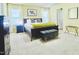 Bright bedroom with neutral carpet, a large bed, and an ensuite bathroom door for an open feel at 4809 Kaycee Ct, Raleigh, NC 27616