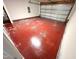 Spacious garage with painted floors, ready to accommodate vehicles and storage needs at 4809 Kaycee Ct, Raleigh, NC 27616