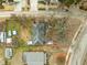 Aerial view of a house and surrounding property, including yard and neighboring houses at 517 Kildaire Farm Rd, Cary, NC 27511
