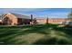Large backyard with grassy area and partial view of neighboring building at 610 Denim Dr, Erwin, NC 28339