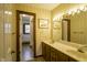 Bathroom with double vanity, mirror, and separate shower at 610 Denim Dr, Erwin, NC 28339