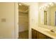 Bathroom with vanity, closet, and tiled floor at 610 Denim Dr, Erwin, NC 28339