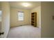 Bright bedroom with carpeted floor and built-in shelving at 610 Denim Dr, Erwin, NC 28339