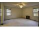 Spacious bedroom with neutral walls and carpeting at 610 Denim Dr, Erwin, NC 28339