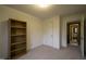 Bedroom with carpeted floor and access to hallway at 610 Denim Dr, Erwin, NC 28339