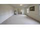 Bright dining room with neutral walls and carpeting at 610 Denim Dr, Erwin, NC 28339