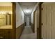 Long hallway with carpeted floor and doors to other rooms at 610 Denim Dr, Erwin, NC 28339