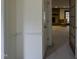Bright hallway with view into living room with fireplace at 610 Denim Dr, Erwin, NC 28339