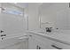 Modern bathroom features white cabinets, vanity, and shower-tub combination at 6294 River Rd, Fuquay Varina, NC 27526
