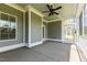 Comfortable screened porch with wood-look siding and ample space for outdoor living at 6294 River Rd, Fuquay Varina, NC 27526
