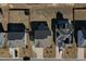 Aerial view of houses with gray roofs and solar panels at 897 Golden Plum Ln, Zebulon, NC 27597