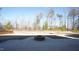 Spacious backyard with firepit and tire swing at 897 Golden Plum Ln, Zebulon, NC 27597