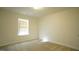Bright and airy bedroom with neutral walls and carpet at 897 Golden Plum Ln, Zebulon, NC 27597