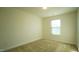Simple bedroom with neutral walls and carpet flooring at 897 Golden Plum Ln, Zebulon, NC 27597