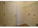 Laundry room with built-in shelving and hookups at 897 Golden Plum Ln, Zebulon, NC 27597