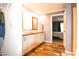 Bathroom featuring a double vanity and a doorway leading into a bedroom at 979 Natchez Trce, Fuquay Varina, NC 27526