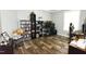 Spacious office area featuring wood-look floors, shelving, and a dedicated workspace at 979 Natchez Trce, Fuquay Varina, NC 27526