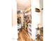 Walk-in pantry with ample shelving, perfect for organized food storage and easy access to kitchen essentials at 979 Natchez Trce, Fuquay Varina, NC 27526