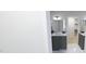 Elegant bathroom with a double vanity, modern fixtures, and a view into an adjacent bathroom at 147 Charlotte Knoll St # 14, Zebulon, NC 27597