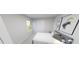 Cozy bedroom with a comfortable bed, neutral decor, and a window for natural light at 147 Charlotte Knoll St # 14, Zebulon, NC 27597