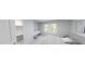 Inviting bedroom with bright windows, a white dresser, and a comfortable bed at 147 Charlotte Knoll St # 14, Zebulon, NC 27597
