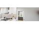 Well-equipped kitchen with white cabinets, tile backsplash, and stainless steel appliances, with pantry view at Tbd Charlotte Knoll St # 14, Zebulon, NC 27597