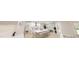 Bright, modern kitchen featuring a large island, stainless steel appliances, and pendant lighting at 147 Charlotte Knoll St # 14, Zebulon, NC 27597