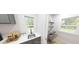 Bright, small office space with ample lighting, gray cabinets and view of nature at Tbd Charlotte Knoll St # 14, Zebulon, NC 27597