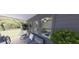 Inviting porch features a hanging chair and outdoor seating, perfect for relaxing and enjoying the view at 147 Charlotte Knoll St # 14, Zebulon, NC 27597