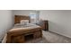 Charming bedroom with rustic wooden bed and dresser at 1007 Cherry Stem Rd, Haw River, NC 27258
