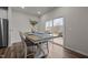 Dining area with wooden table and sliding glass door leading to patio at 1007 Cherry Stem Rd, Haw River, NC 27258