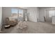 Bright loft area with window seating and a cozy armchair at 1007 Cherry Stem Rd, Haw River, NC 27258