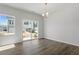 Bright dining room with natural light and wood flooring at 103 Central Townes Way # 297, Raleigh, NC 27603