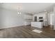View of kitchen and dining room with an open floor plan at 103 Central Townes Way # 297, Raleigh, NC 27603