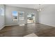 Bright living room with natural light and wood flooring at 103 Central Townes Way # 297, Raleigh, NC 27603