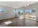 Bright living room with natural light and wood flooring at 103 Central Townes Way # 297, Raleigh, NC 27603