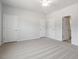 Spacious bedroom featuring neutral walls, carpeted floors, and a ceiling fan at 104 Central Townes Way # 296, Raleigh, NC 27603