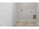 Laundry room with tile flooring and in-wall plumbing connections at 104 Central Townes Way # 296, Raleigh, NC 27603