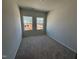Bedroom with neutral carpet and natural light at 107 Central Townes Way # 298, Raleigh, NC 27603