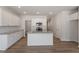 Kitchen with white cabinets and stainless steel appliances at 107 Central Townes Way # 298, Raleigh, NC 27603